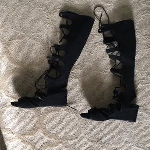 Black laces up gladiator sandal with 2 inch wedge